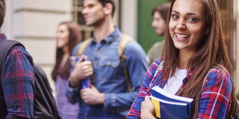 female-student-holding-her-books